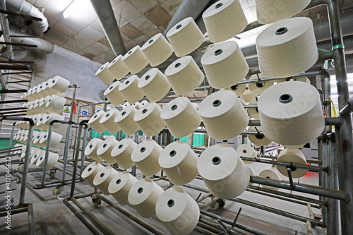 Cotton yarn piled up waiting to be packed in a spinning mill