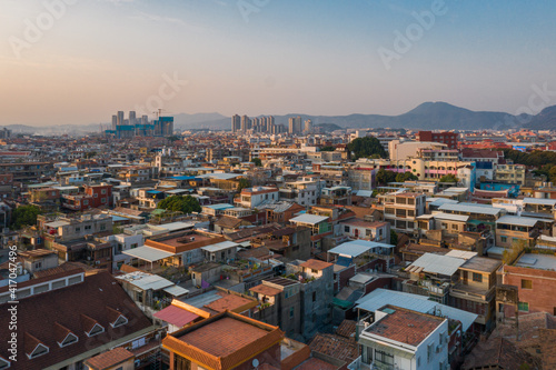 Aerial view of old city and modern city skyline in Quanzhou at dusk