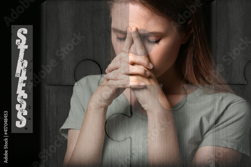 Stressed young woman on dar...