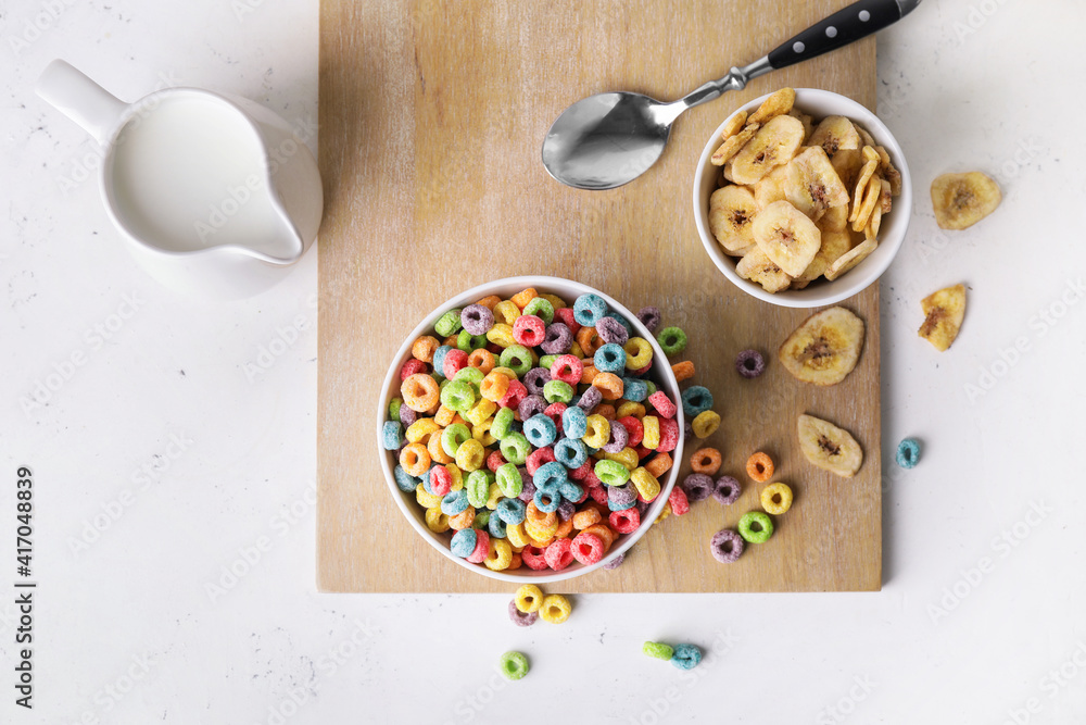 Composition with tasty cereal rings on light background Composition with tasty cereal rings on light background