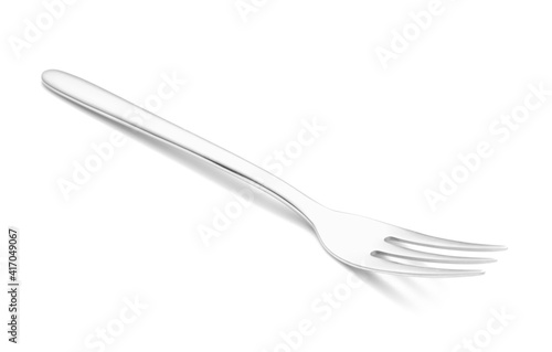 Dessert fork on white background