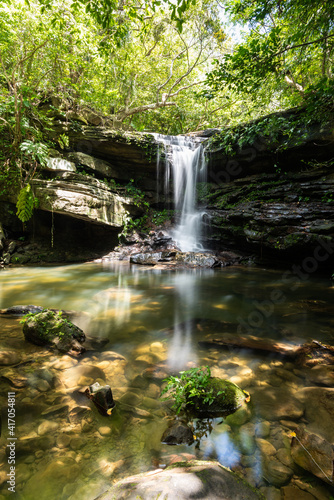 Kuura waterfall with its serene atmosphere illuminated by a soft sunligh. Iriomote Island.