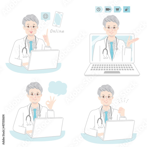 オンライン診察をするシニア男性医師とパソコン