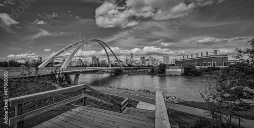 Bridge over river. Panoramic view of downtown Edmonton, Alberta, Canada in Black and White.