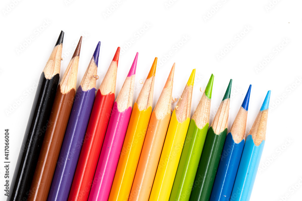 Fototapeta premium Colored pencils background. Color pencils on white background.
