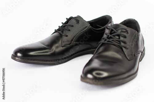 black classic men's shoes on a white background