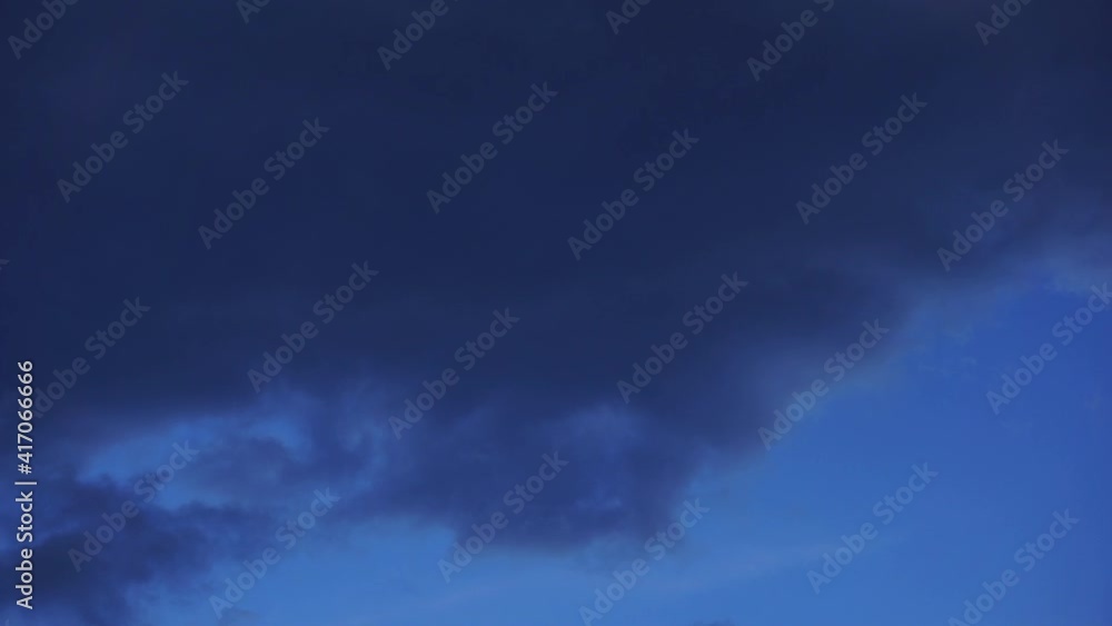 Time lapse of moon behind dark clouds Time lapse of moon behind dark clouds