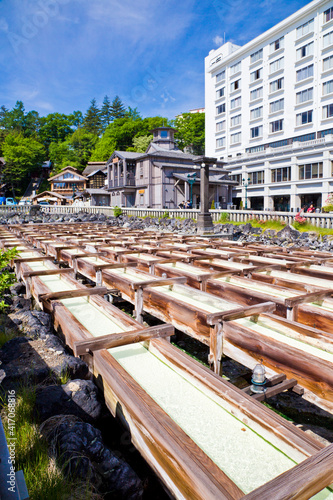 
Yubatake onsen, hot spring wooden boxes with mineral water in Kusatsu onsen, Gunma prefecture, Japan. photo