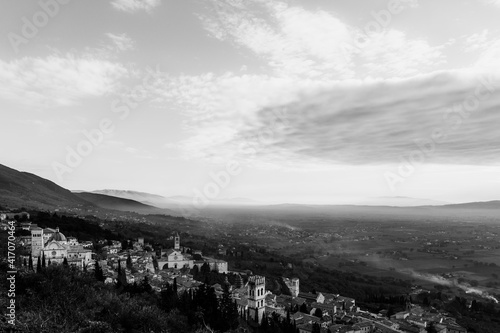 An aerial view of Assisi town (Umbria, Italy) with valley on the background