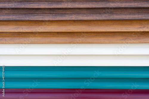multicolored metal siding, samples for product advertising. Sale of siding for the facade of the house
