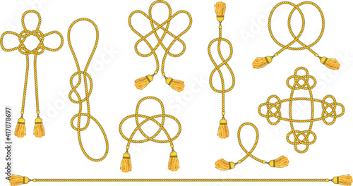 Cord with tassels tied into a woven knot.