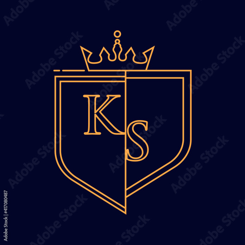 KS initial logotype, colored orange with emblem and crown, line art and classic design, isolated on dark background. photo