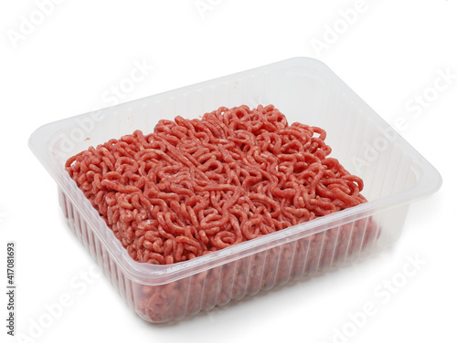 Obraz na plátně raw fresh beef minced meat in plastic container on white background