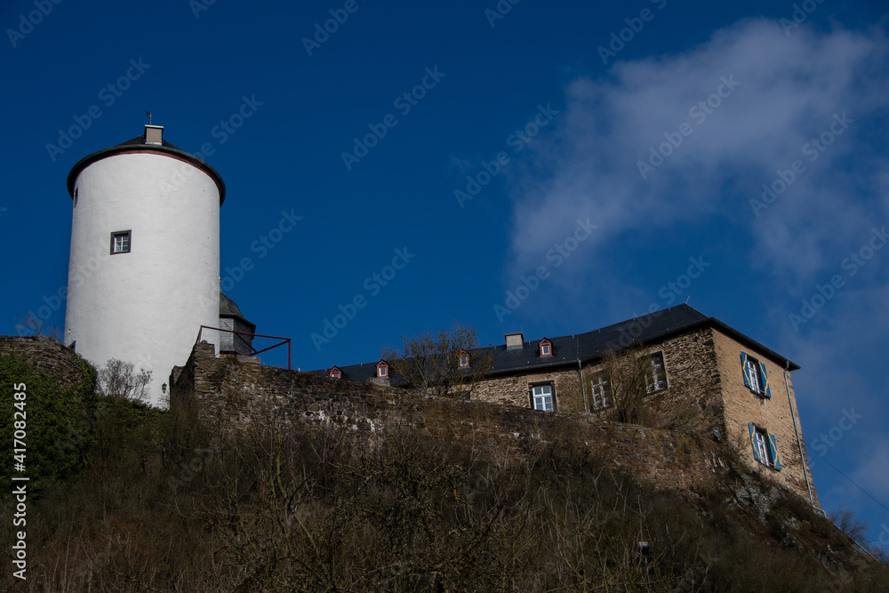 The medieval castle Kreuzberg and a blue sky with clouds