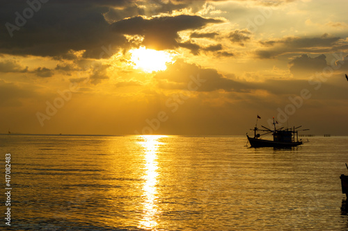 boat at sunset,Fishing boats at sunset, Bang Lamung, Chon Buri, Thailand © chanin
