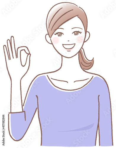 OKサインを出す女性
