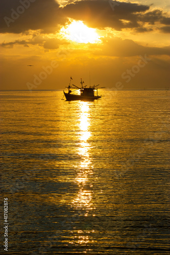 sailboat at sunset , Fishing boats at sunset, Bang Lamung, Chon Buri, Thailand © chanin