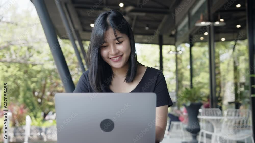 Business woman typing, searching and checking document in modern cafe. Business woman typing, searching and checking document in modern cafe.