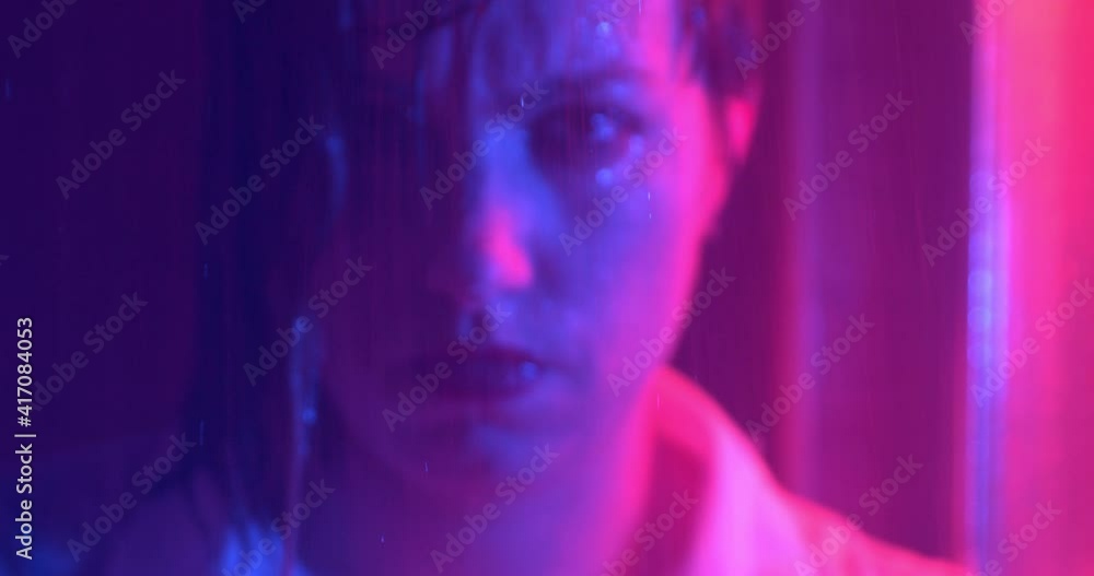obsessive compulsive disorder - girl dressed in shower stares at camera obsessive compulsive disorder - girl dressed in shower stares at camera