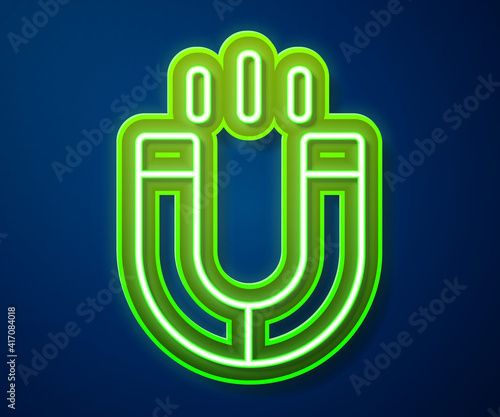 Glowing neon line Magnet icon isolated on blue background. Horseshoe magnet, magnetism, magnetize, attraction. Vector.