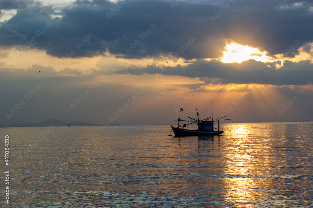 boat at sunset , 