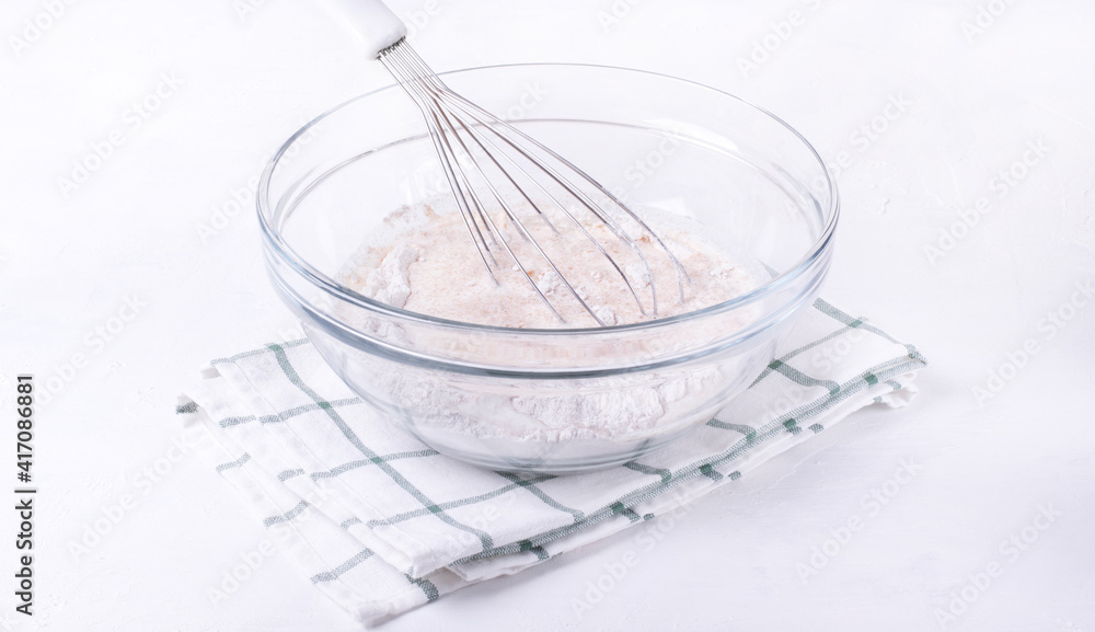 Rye and wheat flour are mixed in the glass bowl with whisk. Dry ingredients. Step by step recipe of crepes with rye flour. Step 1 Rye and wheat flour are mixed in the glass bowl with whisk. Dry ingredients. Step by step recipe of crepes with rye flour. Step 1