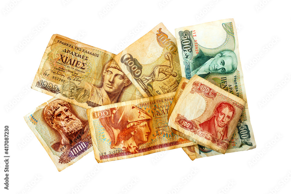 Old Greek money. Paper banknotes in denominations of 1000, one hundred and five hundred drachmas. Isolated on white. Old Greek money. Paper banknotes in denominations of 1000, one hundred and five hundred drachmas. Isolated on white.