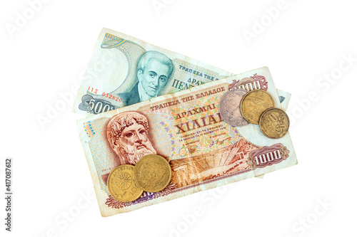 Old Greek money. Paper banknotes in denominations of 1000, one hundred and five hundred drachmas. Isolated on white.