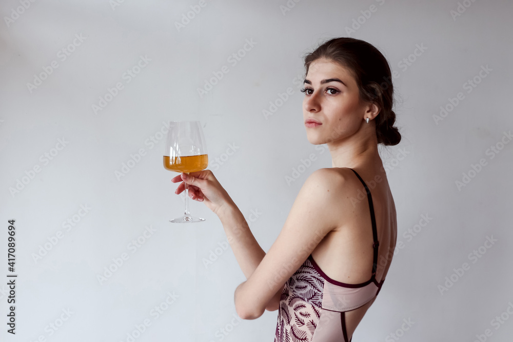 woman enjoying glass of white wine woman enjoying glass of white wine
