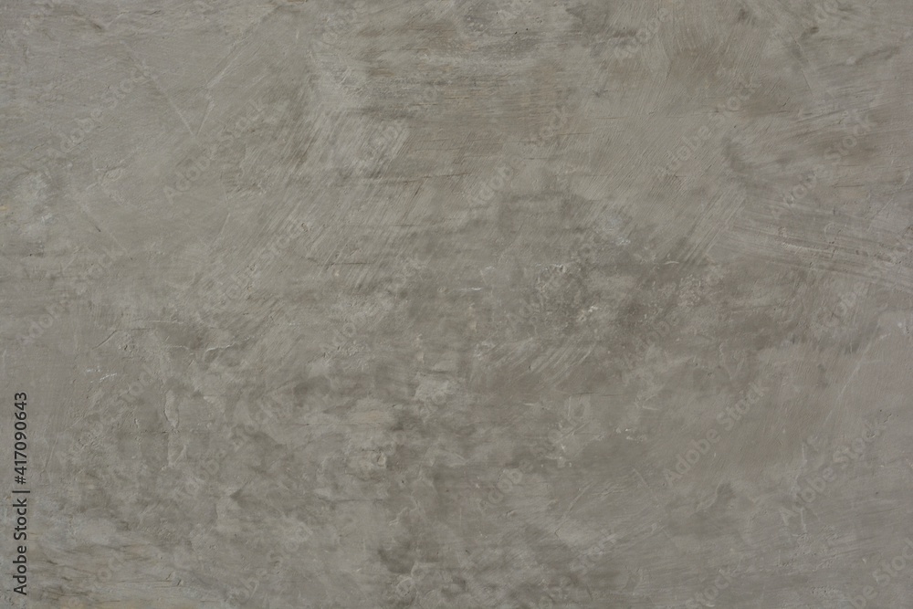 Dark gray textured decorative background of rough aged plaster with space for text Dark gray textured decorative background of rough aged plaster with space for text