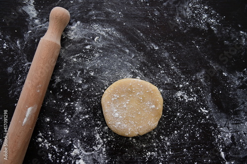 Rolling pin and dough for pizza
