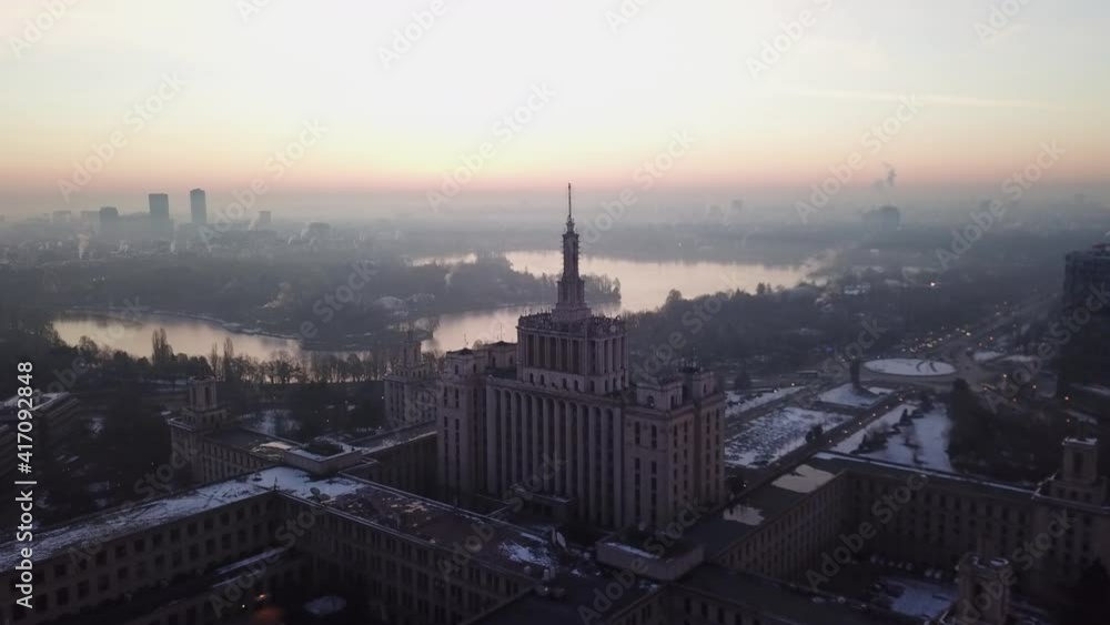 Drone Video of Casa Presei Libere in Bucharest at sunrise with Herastrau Lake and Park in the background. Drone Video of Casa Presei Libere in Bucharest at sunrise with Herastrau Lake and Park in the background.