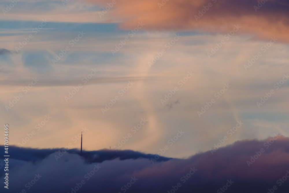 colorful sunset over Mount Wellington in Tasmania, Australia with pink and purple clouds colorful sunset over Mount Wellington in Tasmania, Australia with pink and purple clouds