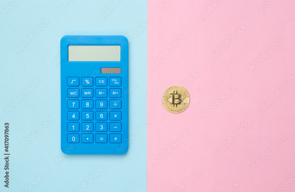 Calculator and bitcoin on blue pink pastel background. Top view Calculator and bitcoin on blue pink pastel background. Top view