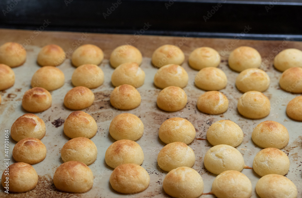 Pao de queijo, a brazilian mini cheese bread finger food, party food and snack Pao de queijo, a brazilian mini cheese bread finger food, party food and snack