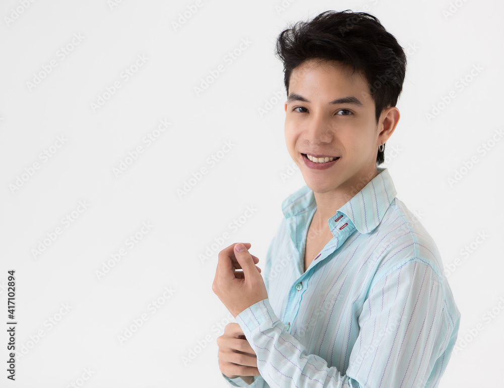 Young and handsome teenage black hair Asian man wearing earrings on white background Young and handsome teenage black hair Asian man wearing earrings on white background