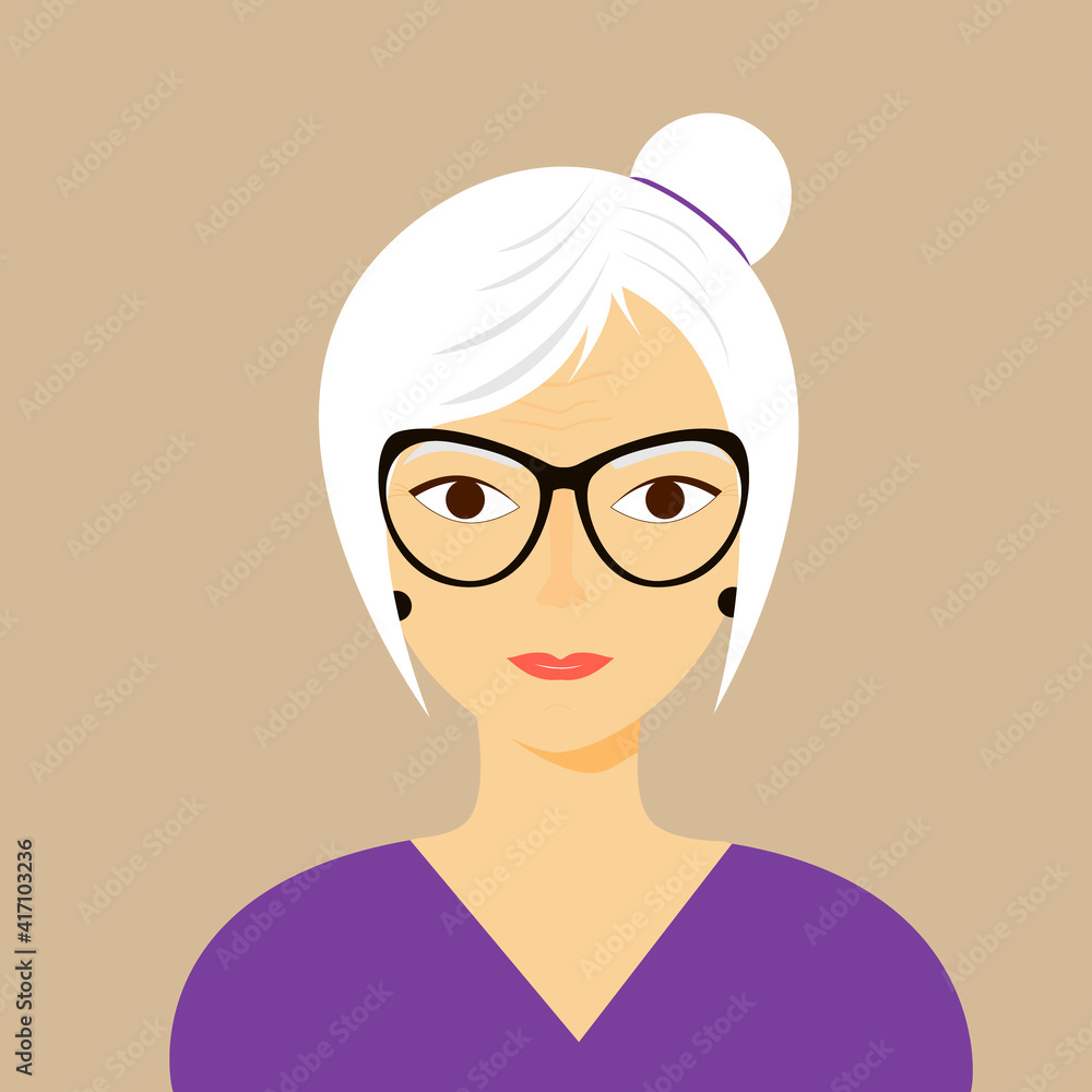 An attractive older woman with gray hair pulled back in a bun An attractive older woman with gray hair pulled back in a bun