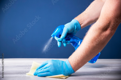 Cleaning surfaces with an antiseptic during a coronavirus epidemic.