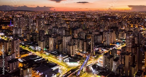 sunset with buildings in the western sector of Goiânia, Goiás, Brazil, hyperlapse over the well-known Simao Carneiro Square photo