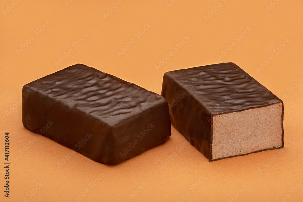 Chocolate candy on a colored background Chocolate candy on a colored background