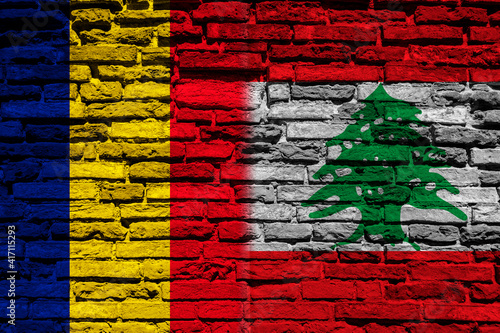 Flag of Chad and Lebanon on brick wall