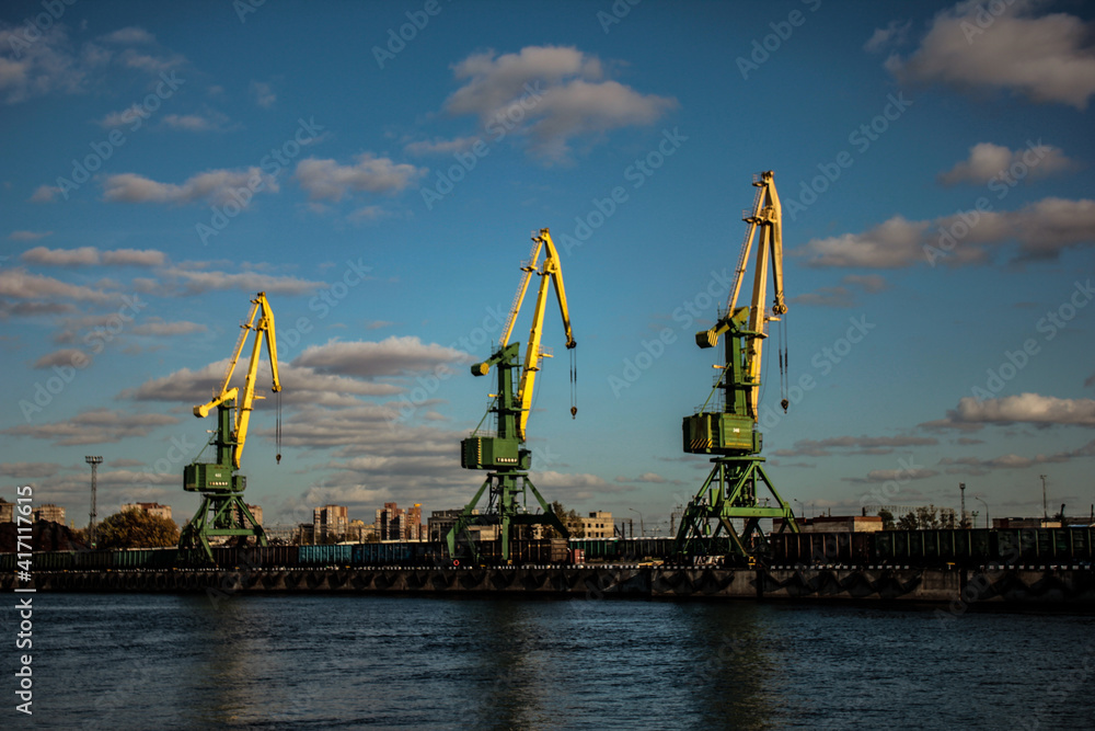 loading cranes on the banks of the water channel