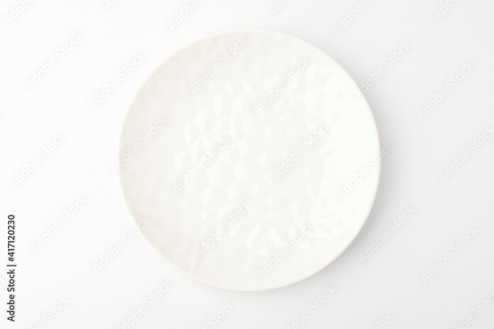 Small plate on a white background Small plate on a white background