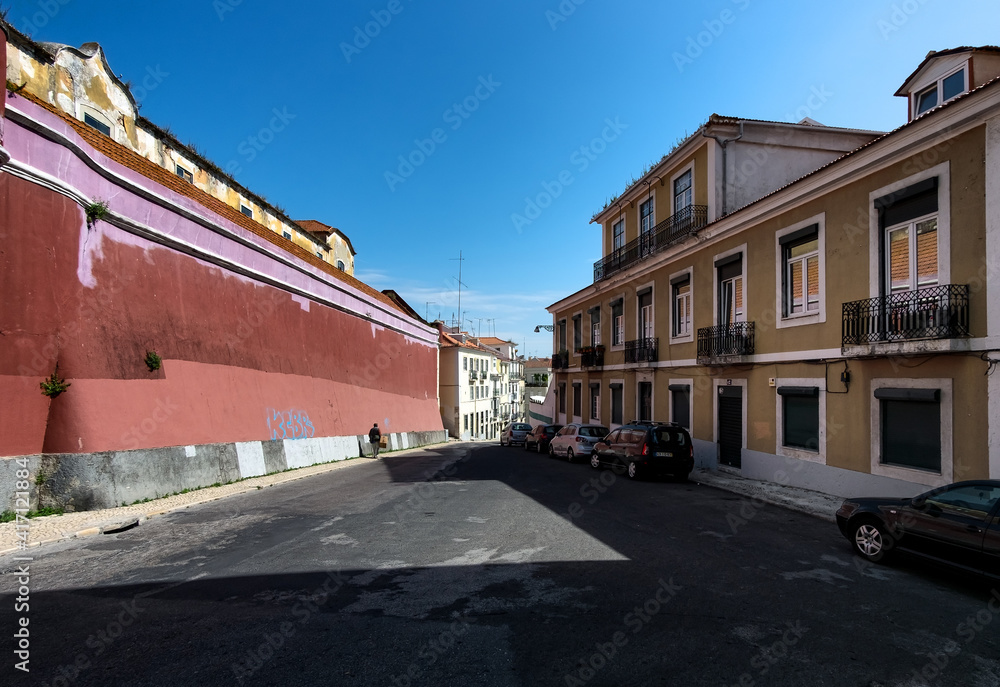 Naklejka premium Early morning in Lisbon. Walks in the old town. Portugal.