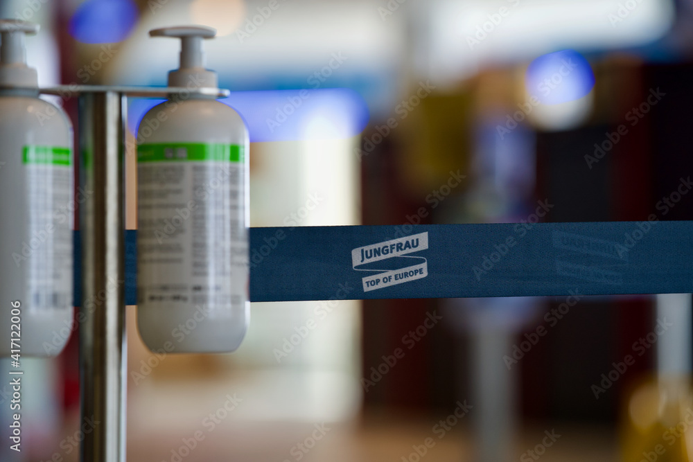 Bottles with disinfection liquid at Jungfraujoch, top of Europe. Photo taken February 26th, 2021, Jakobshorn, Switzerland.