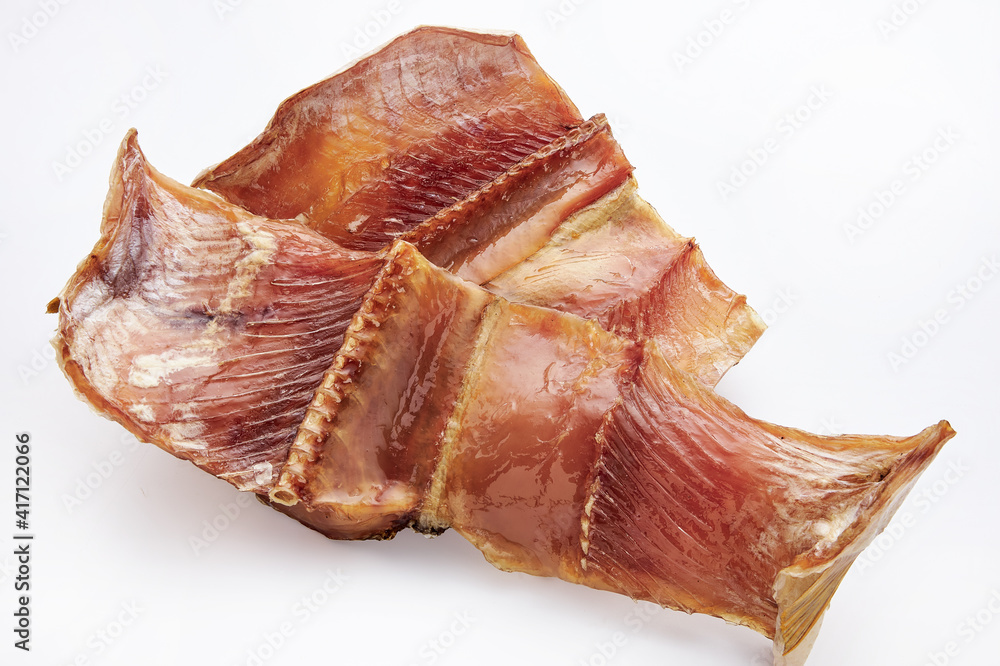 Dried salted fish on a white background Dried salted fish on a white background