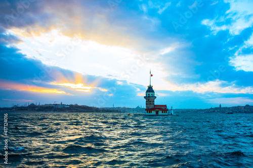 Maiden's Tower at sunset with cloudy sky. Kiz Kulesi in Istanbul. cityscape of Istanbul at sunset. Istanbul background photo. Travel to Istanbul. 