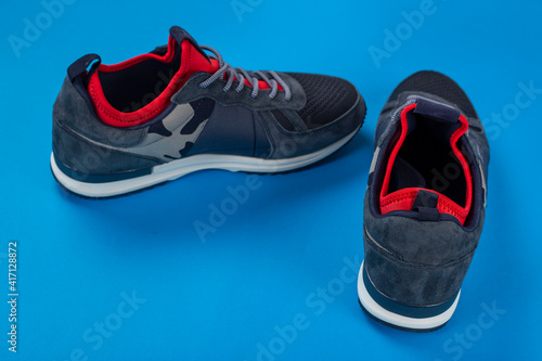 Insulated sneakers on a blue background.