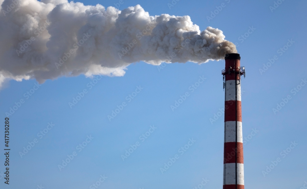 Smoke from the factory chimney. The concept of environmental protection