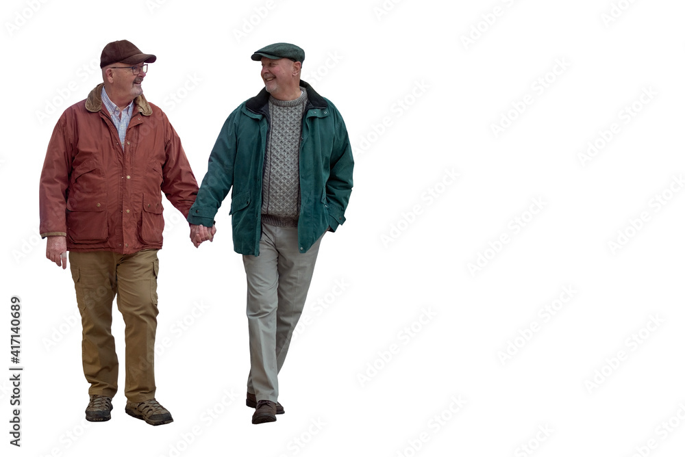 An older LGBT Caucasian male couple hold hands as they walk together. Isolated on a white background. An older LGBT Caucasian male couple hold hands as they walk together. Isolated on a white background.